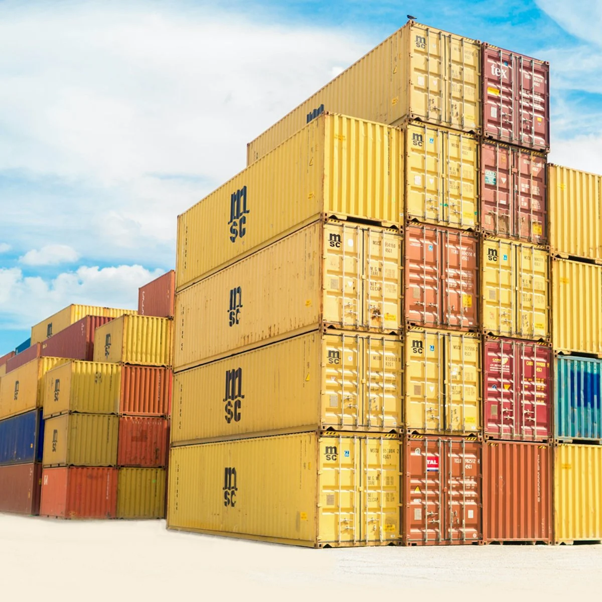 Stacked shipping containers at a freight yard